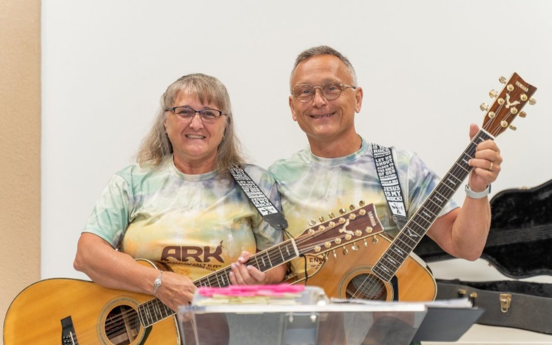 LifePath volunteer couple share the gift of music and teaching